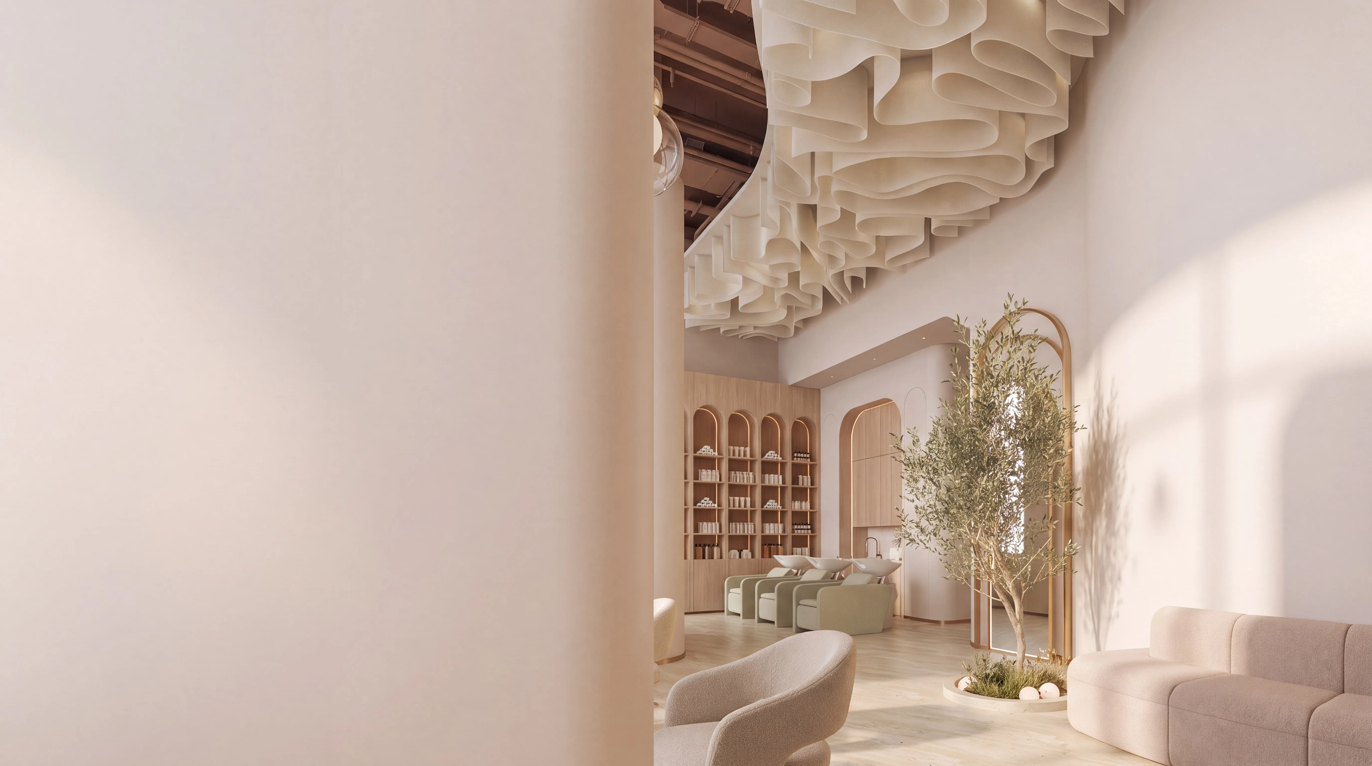 Inside the Glowin lounge: the sculpted ceiling, an olive tree, soft seating in morning light